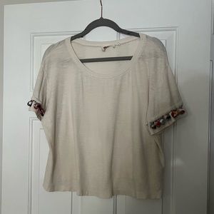Comfy Anthropologie T-shirt with cute pompoms!